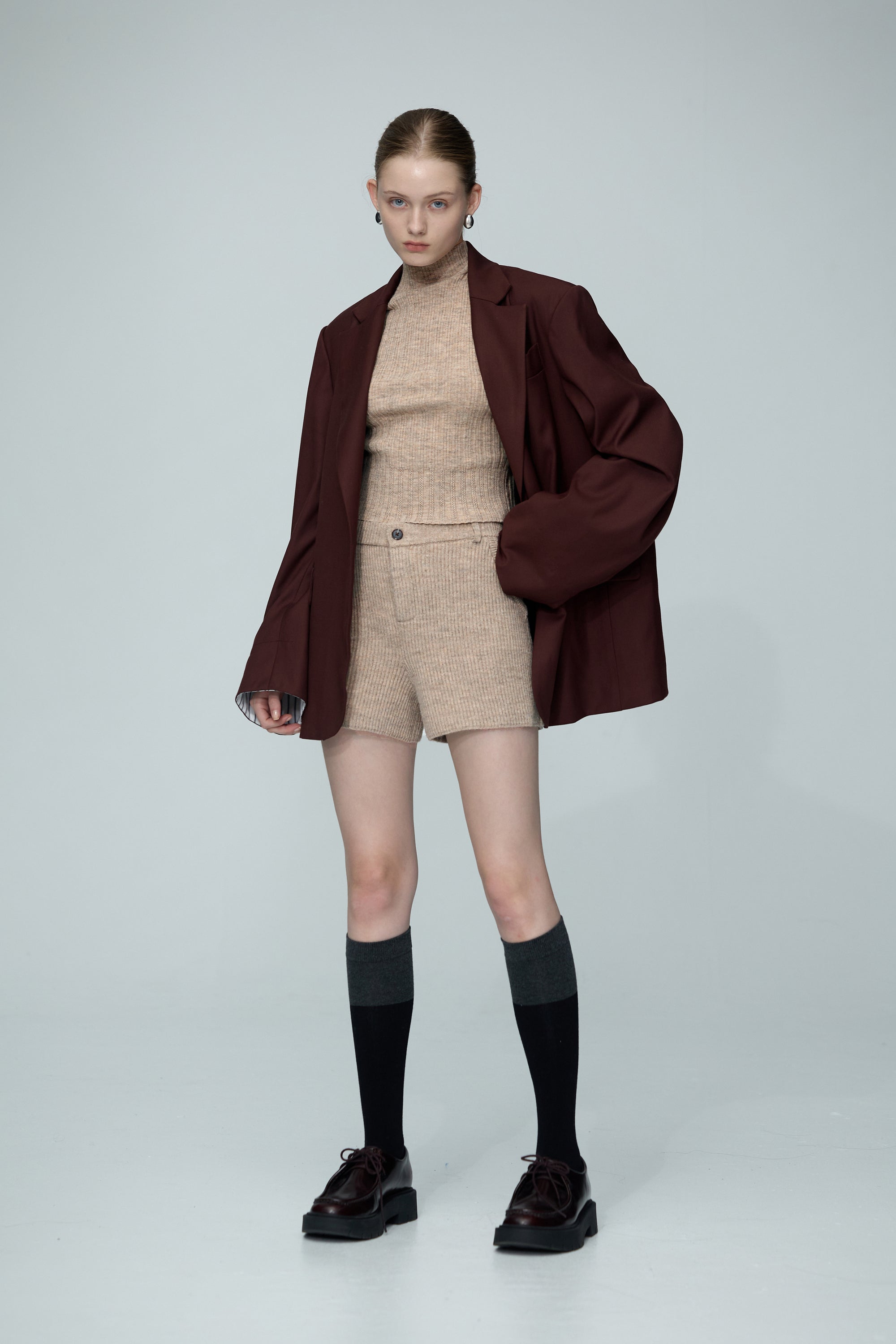 半高領直條排針無袖針織毛衣-駝色