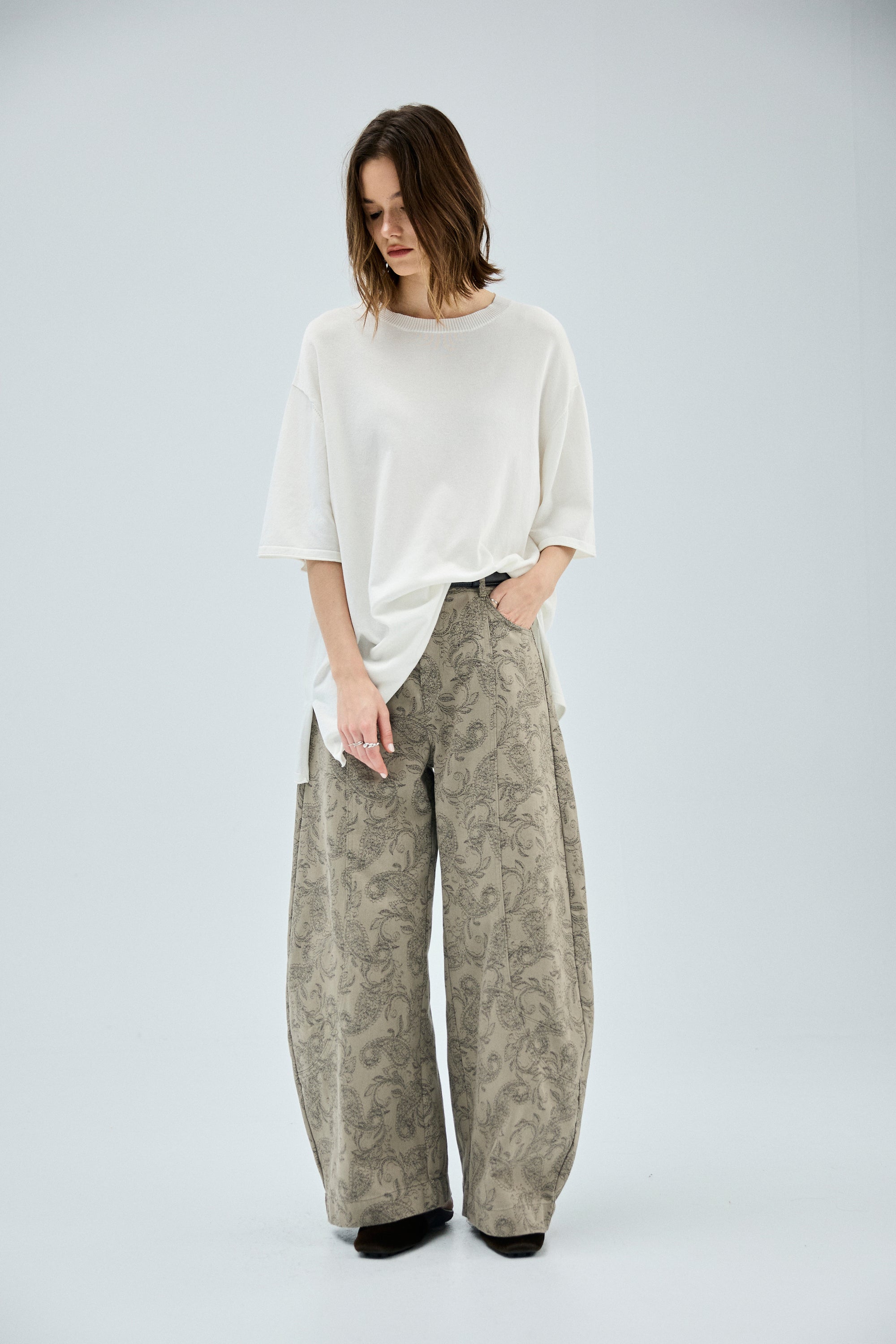 素面捲邊寬鬆長版針織五分袖上衣-白