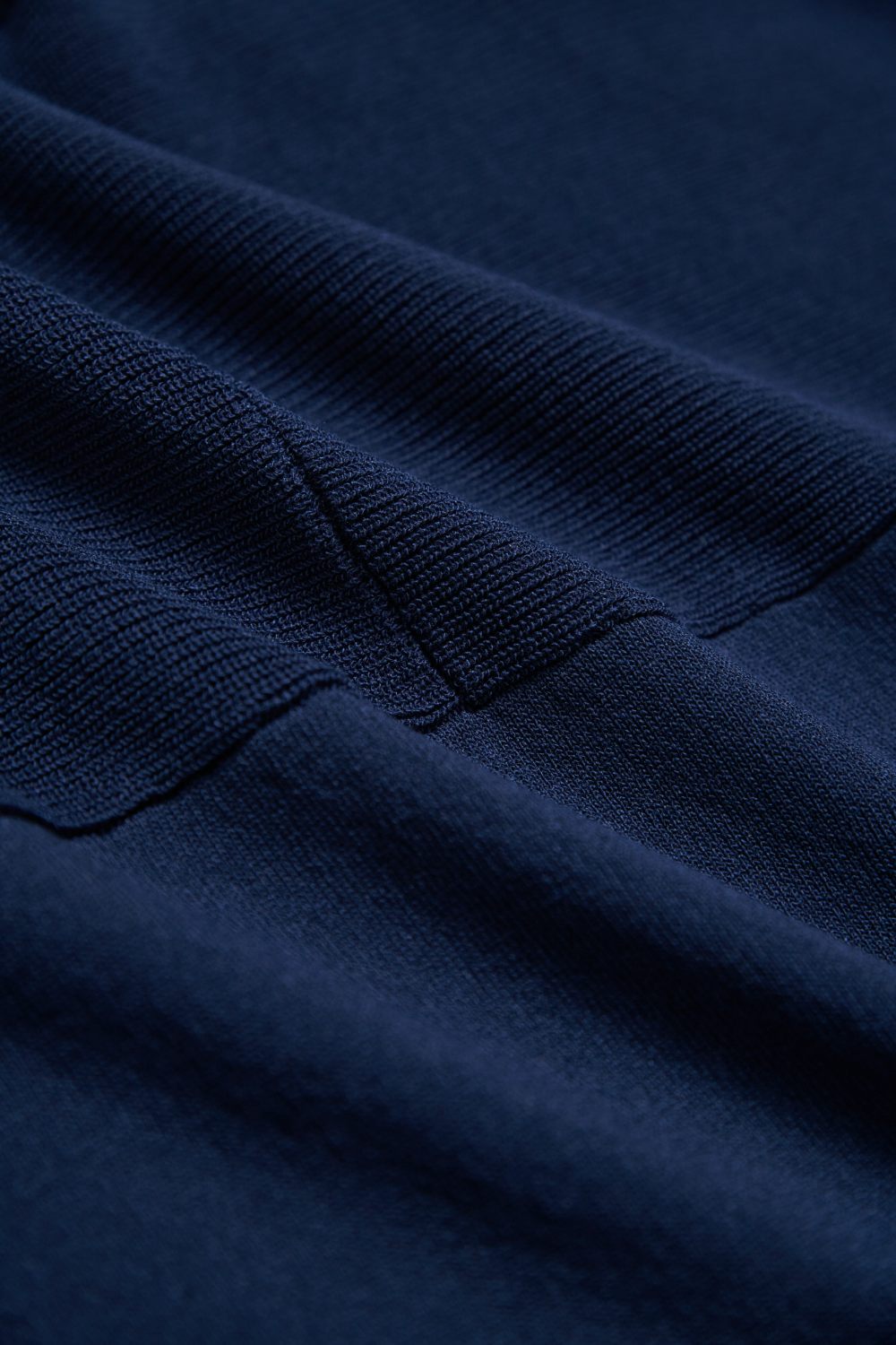 素面捲邊寬鬆長版針織五分袖上衣-藍色