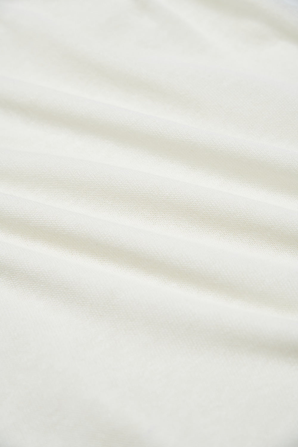 假兩件柔霧萊賽爾針織長袖上衣-白