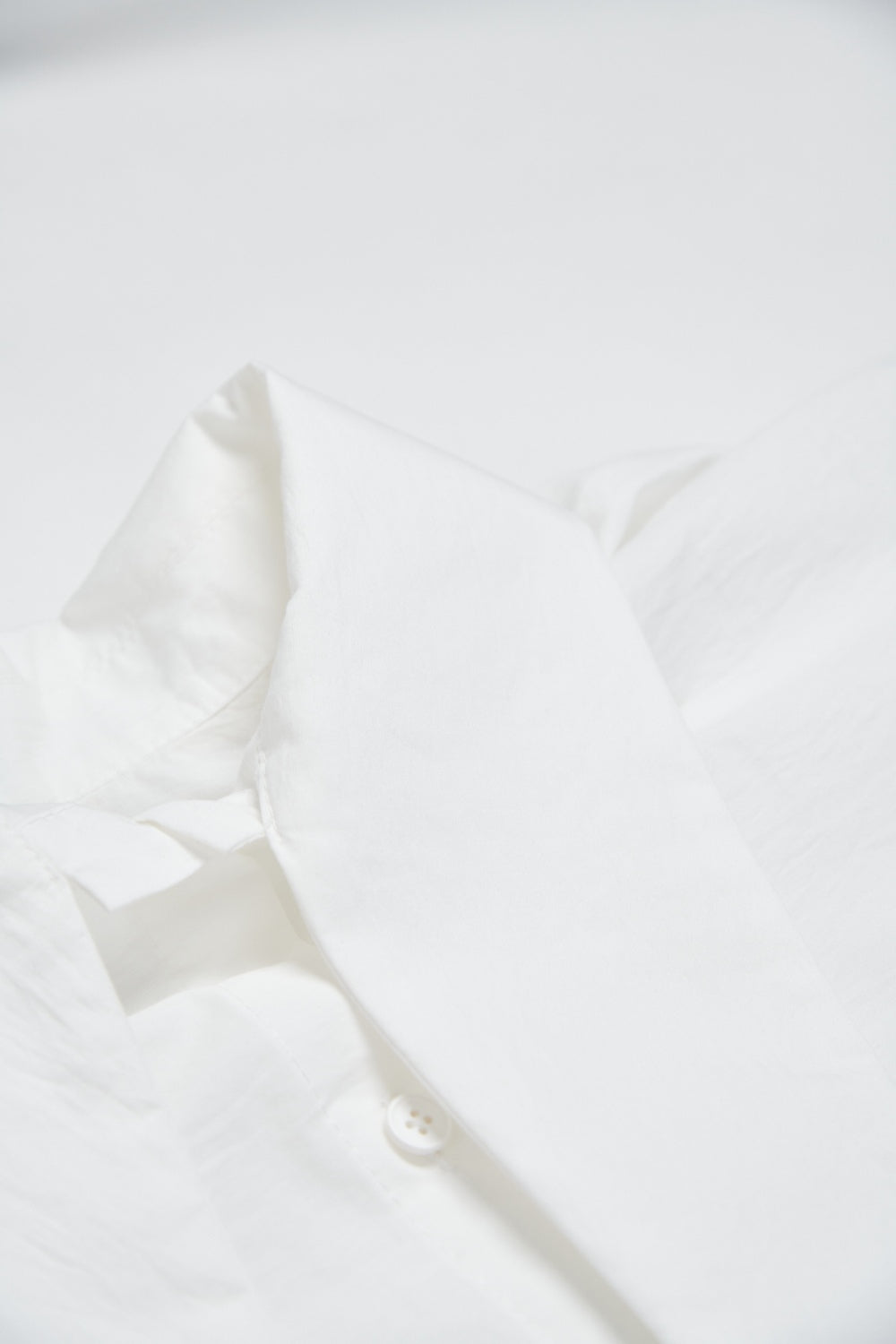 自然皺面感綁帶領長版無袖上衣-白