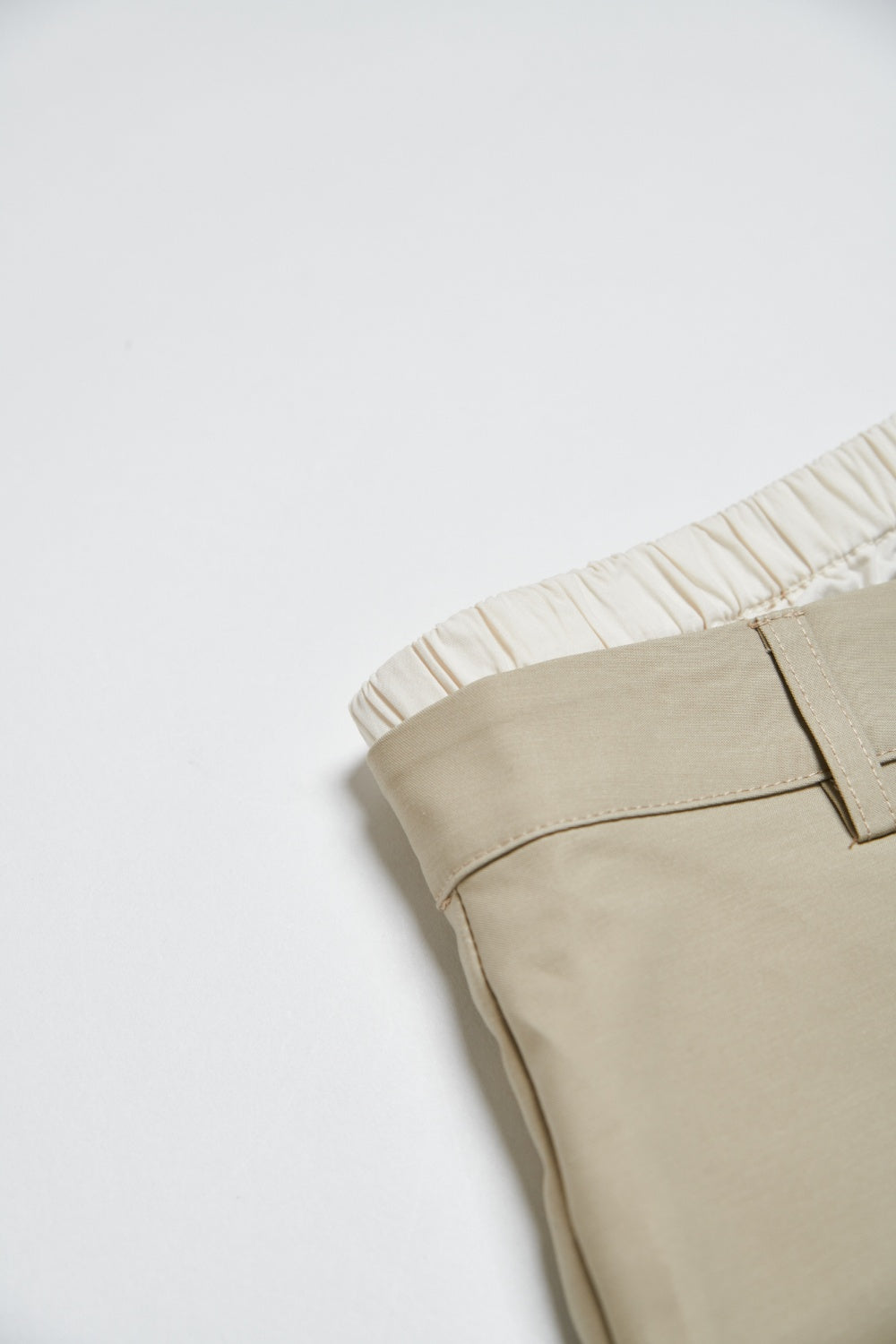 雙釦設計短裙褲(兩件式-內褲外裙)-卡其