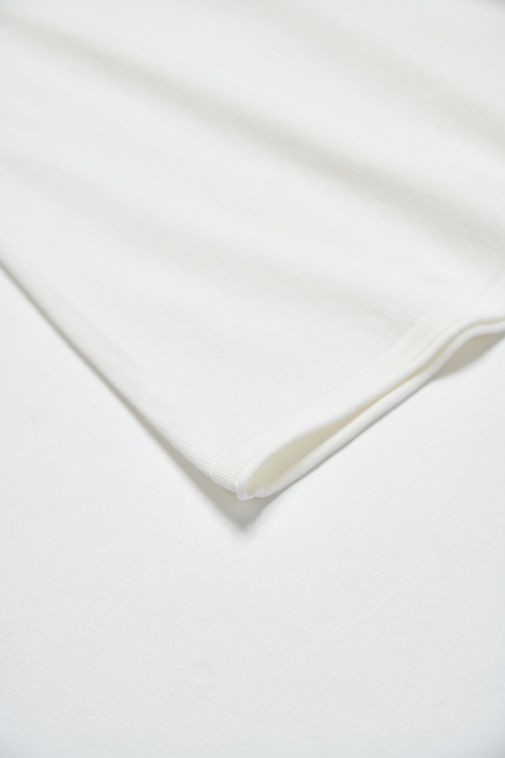 百搭捲邊裙襬針織長裙-白