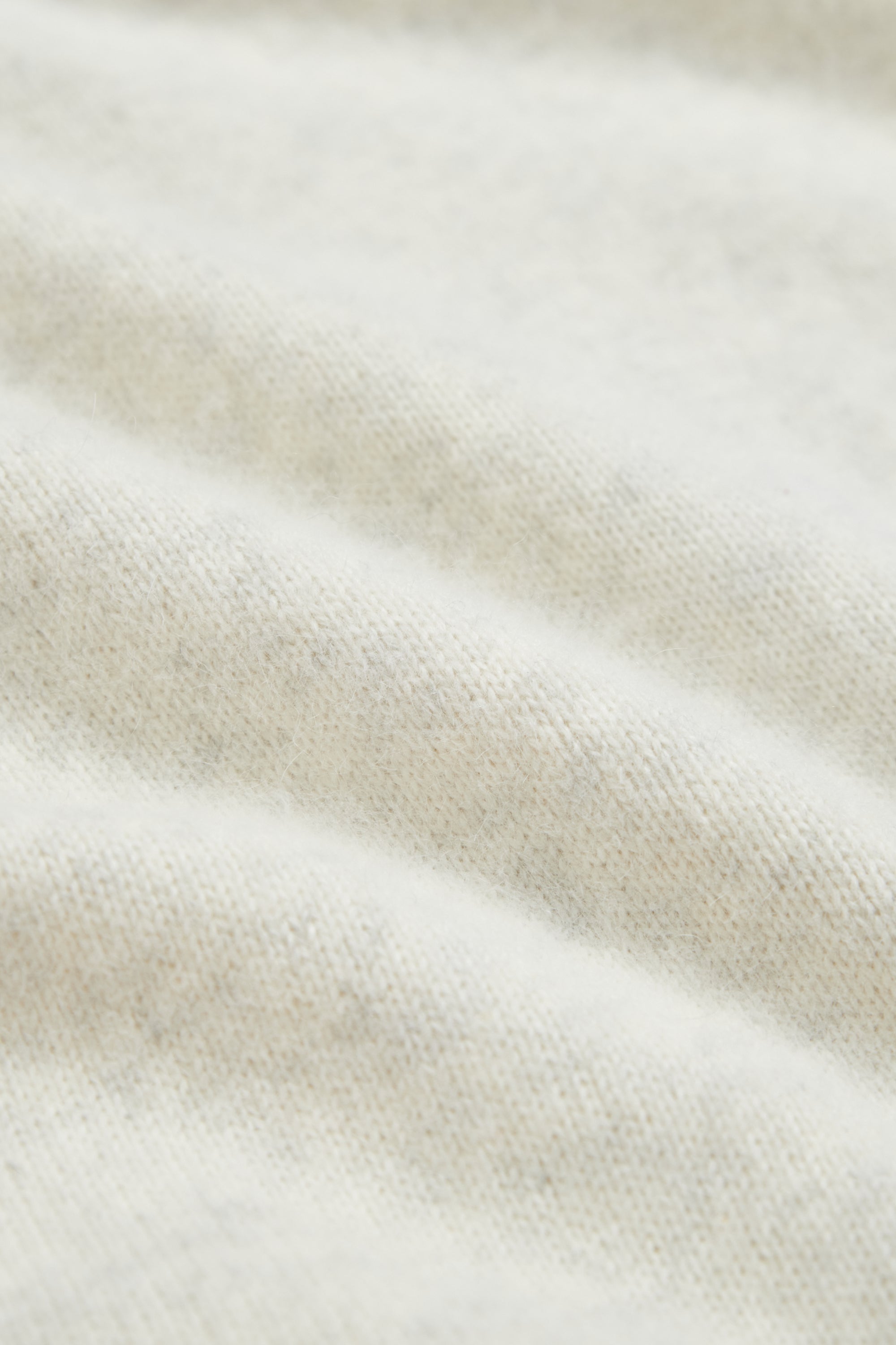 馬海毛圓領後排釦背心式毛衣-米