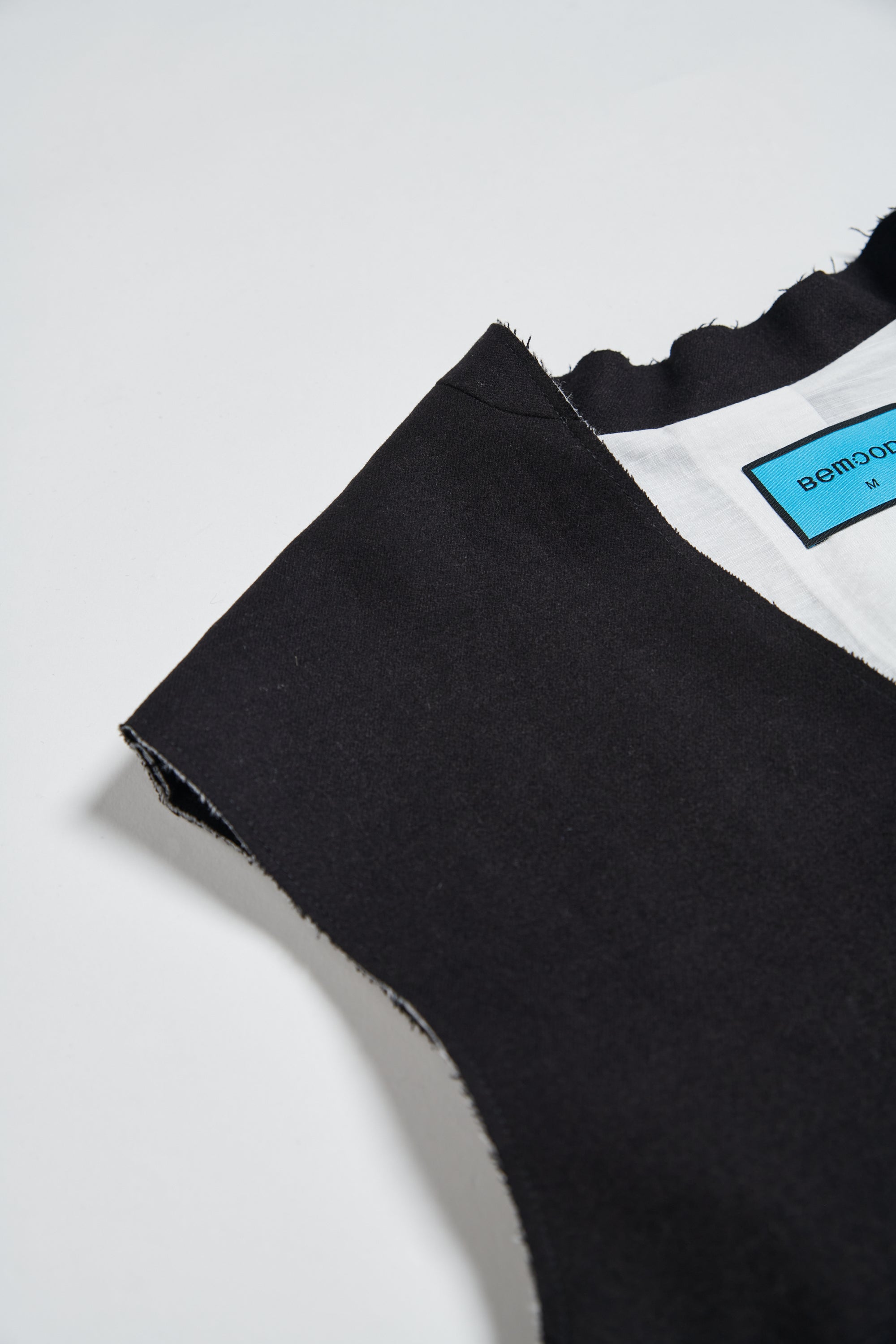 不收邊羊毛混紡長版西裝背心外套-黑