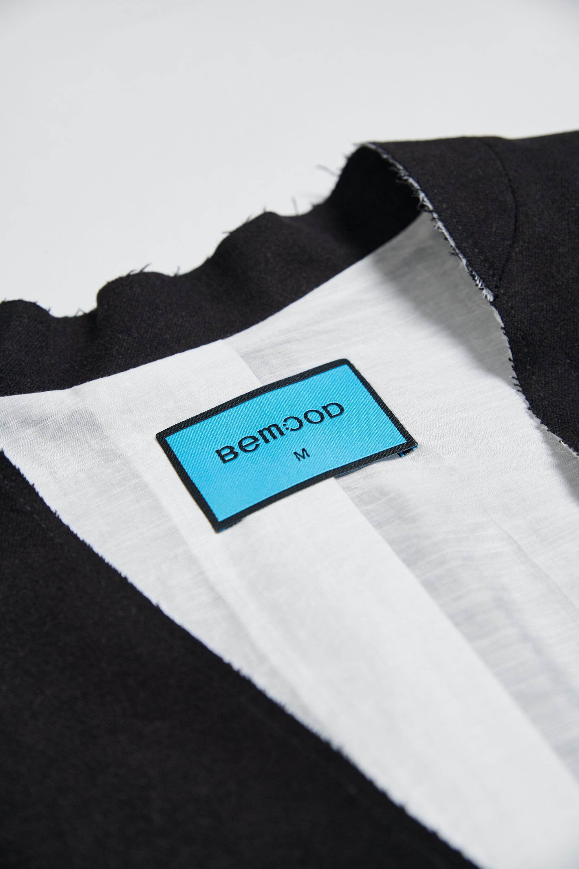 不收邊羊毛混紡長版西裝背心外套-黑