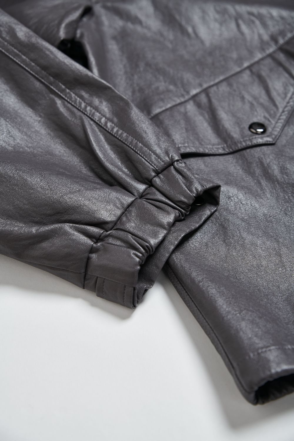 下襬抽繩立領皮革外套-灰