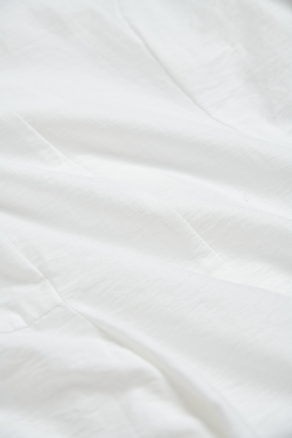 不規則領片車褶收腰襯衫-白